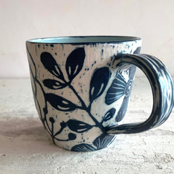 陽刻系列-藍花卉白瓷咖啡杯_陶器馬克杯 第1張的照片