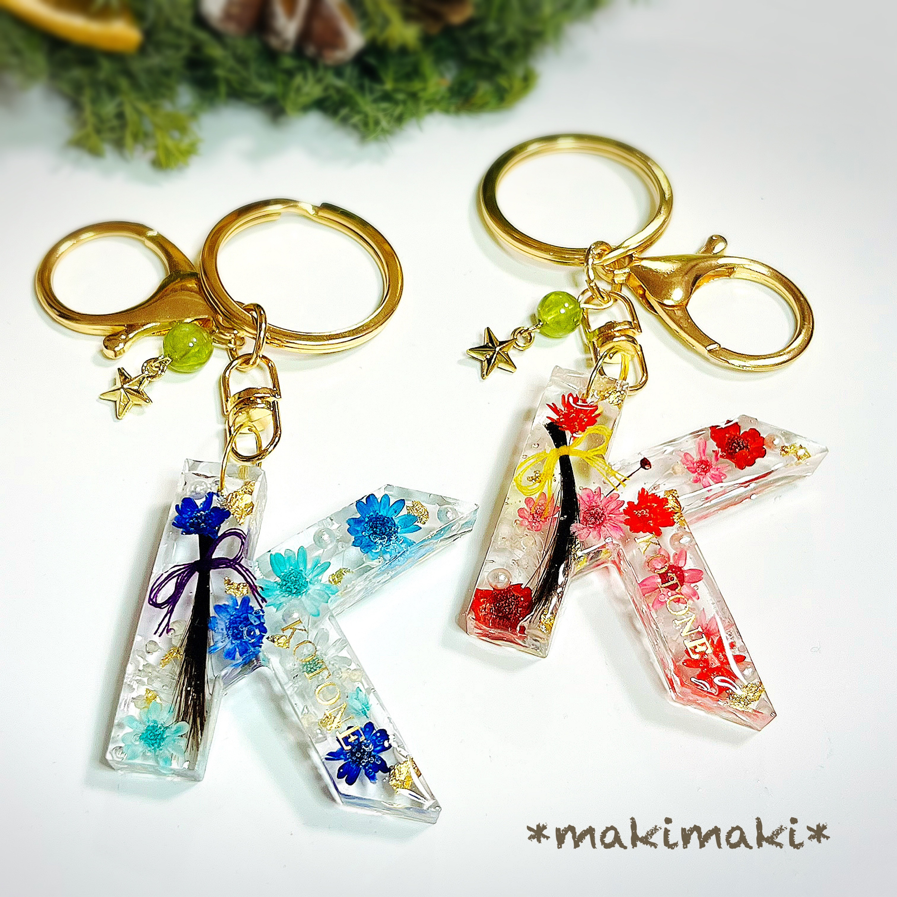 【ファーストカット記念❣️名入り❣️誕生石付き❣️】髪の毛入りイニシャルキーホルダー‼️ キーホルダー *makimaki* 通販|Creema(クリーマ) 新作お試し価格花束イニシャルキーホルダー ハンドメイド レジン