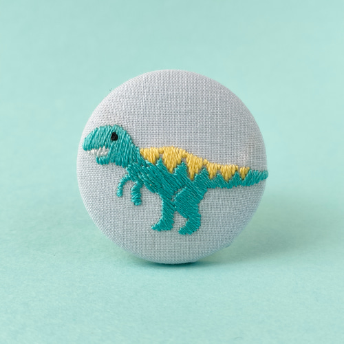 ゆるい恐竜ティラノサウルスの刺繍ブローチ ブローチ かなちゃん手刺繍 