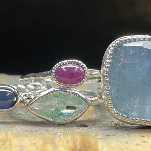 ルビー オーバルカボション クラシカルなミル打ち シルバーSV925リング