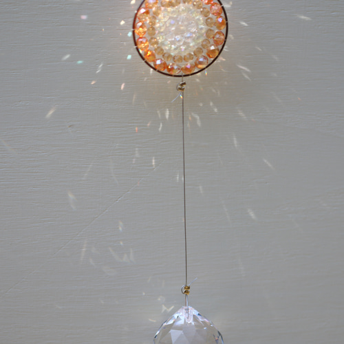 お引越し祝いに。オレンジの光の曼荼羅サンキャッチャー サン