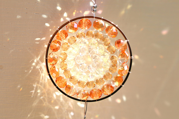 お引越し祝いに。オレンジの光の曼荼羅サンキャッチャー サン