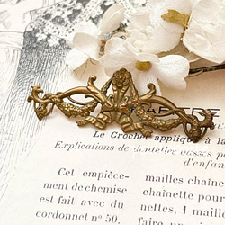 フランスのアンティーク装飾パーツ・小花とリボン 2枚目の画像