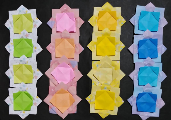 お得です!折り紙(土台は宇宙柄)メダルがコマに変身します。16セットで