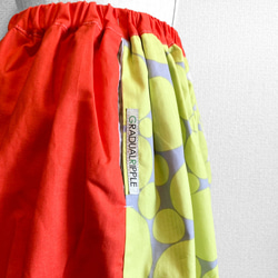 【オレンジ×イエロードットのリバーシブルギャザースカート】 4枚目の画像
