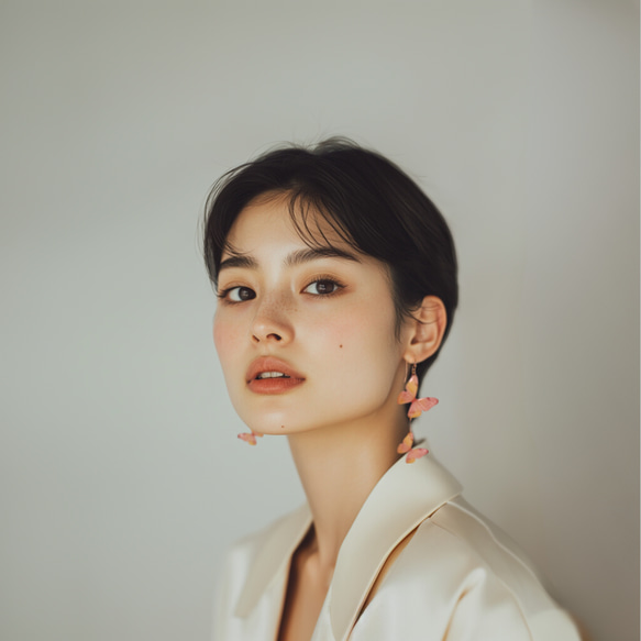 \媒體精選作品/櫻花色蝴蝶耳環（不對稱） 第1張的照片