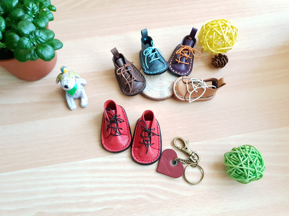 YF74_文化的で創造的な手作りの同心の靴のパワーキーホルダー、魅力