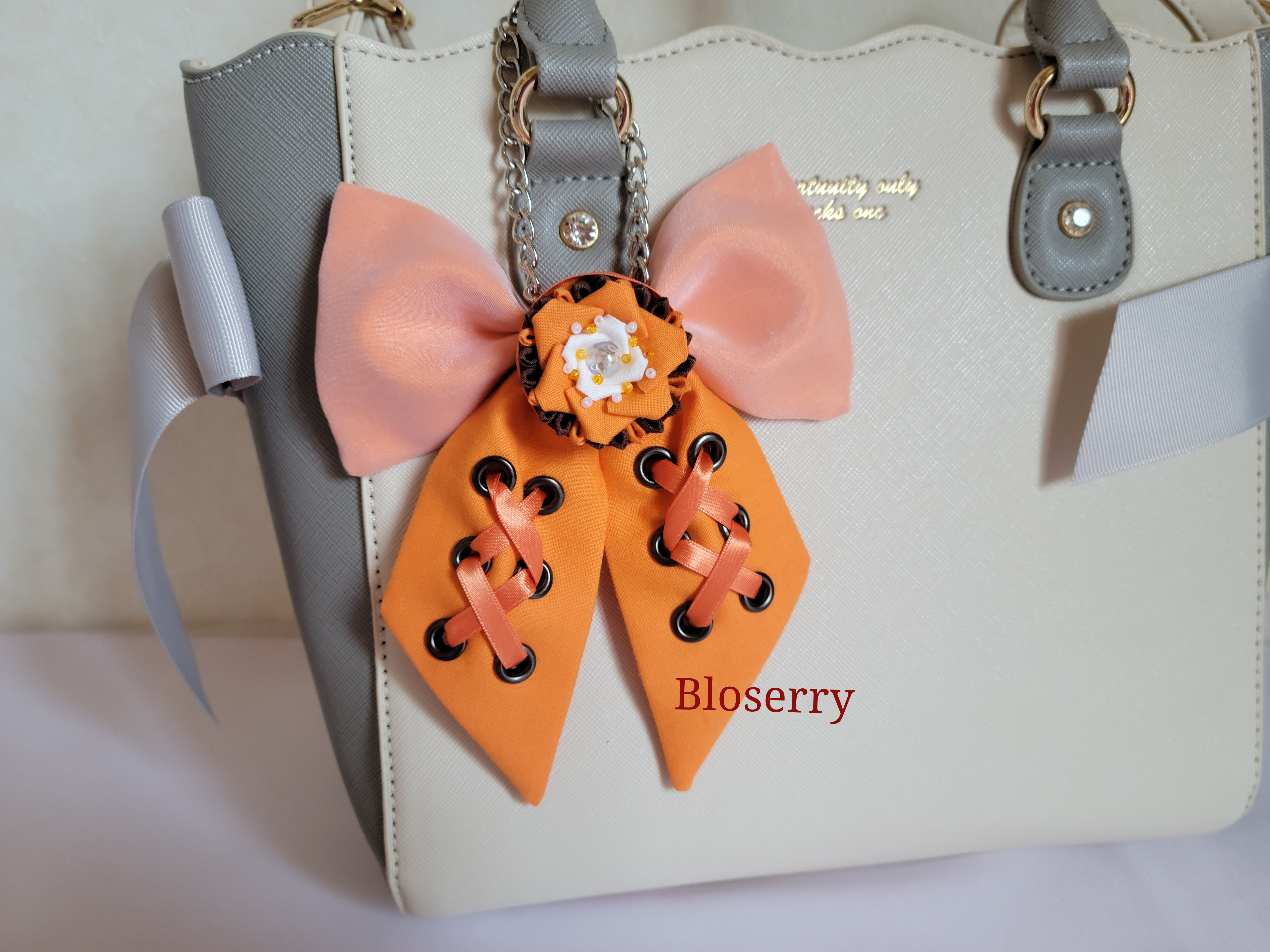 クリームソーダタルトリボン　オレンジ　バッグチャーム