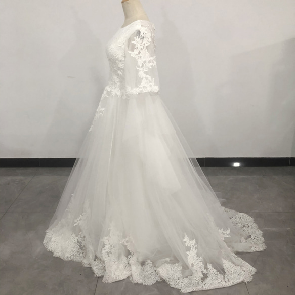 法式婚紗禮服白色精緻蕾絲短款拖地長裙人魚線條優雅透明 第2張的照片