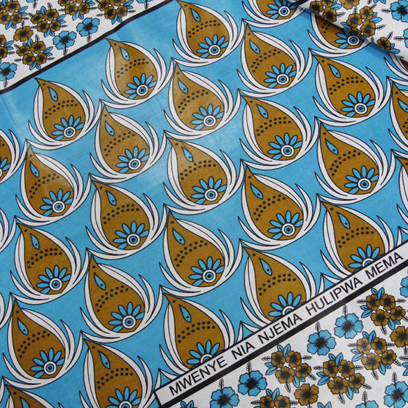 カンガ（ターコイズブルー × アンバー）アフリカ布 ファブリック 布 1枚目の画像