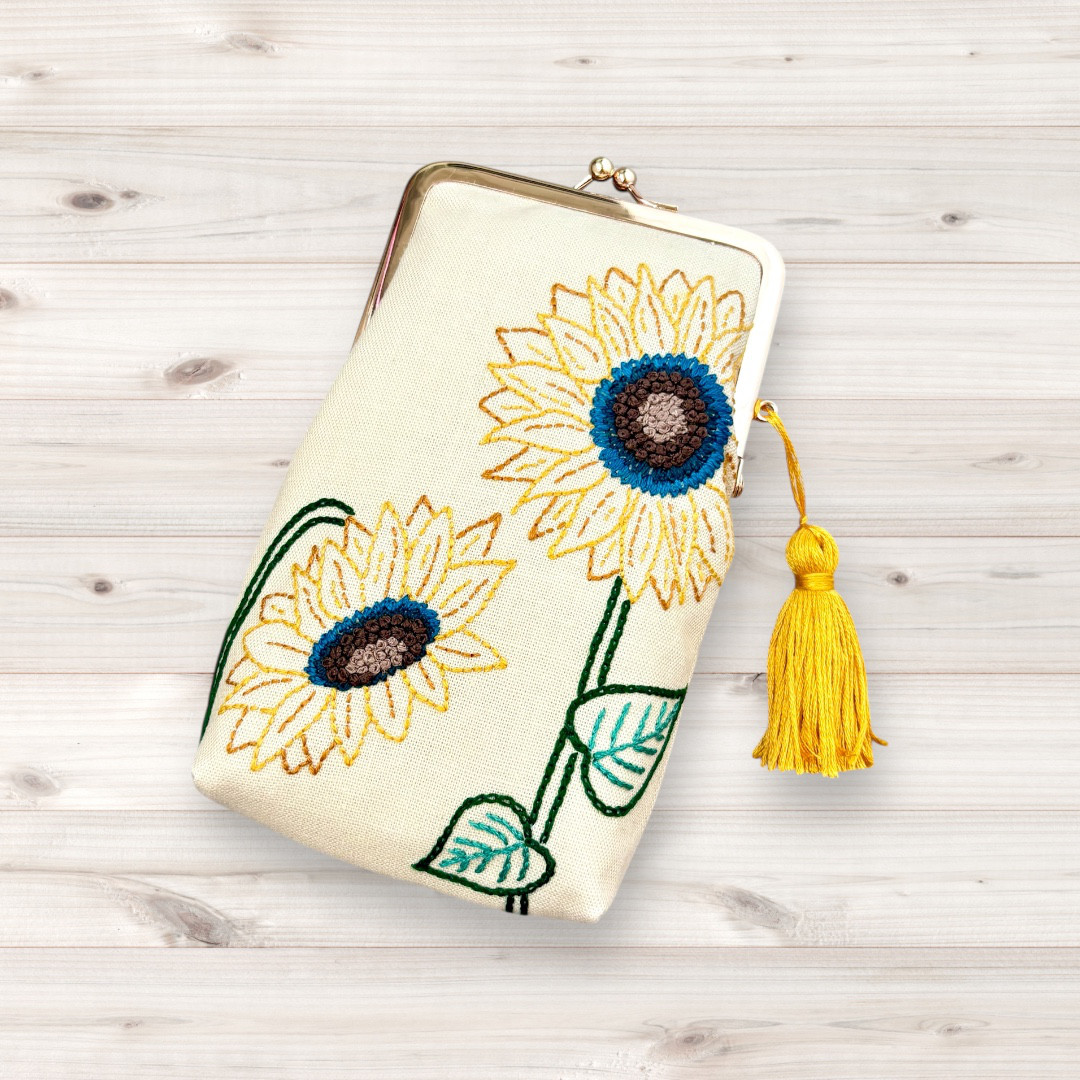 ひまわり刺繍のがま口メガネポーチ
