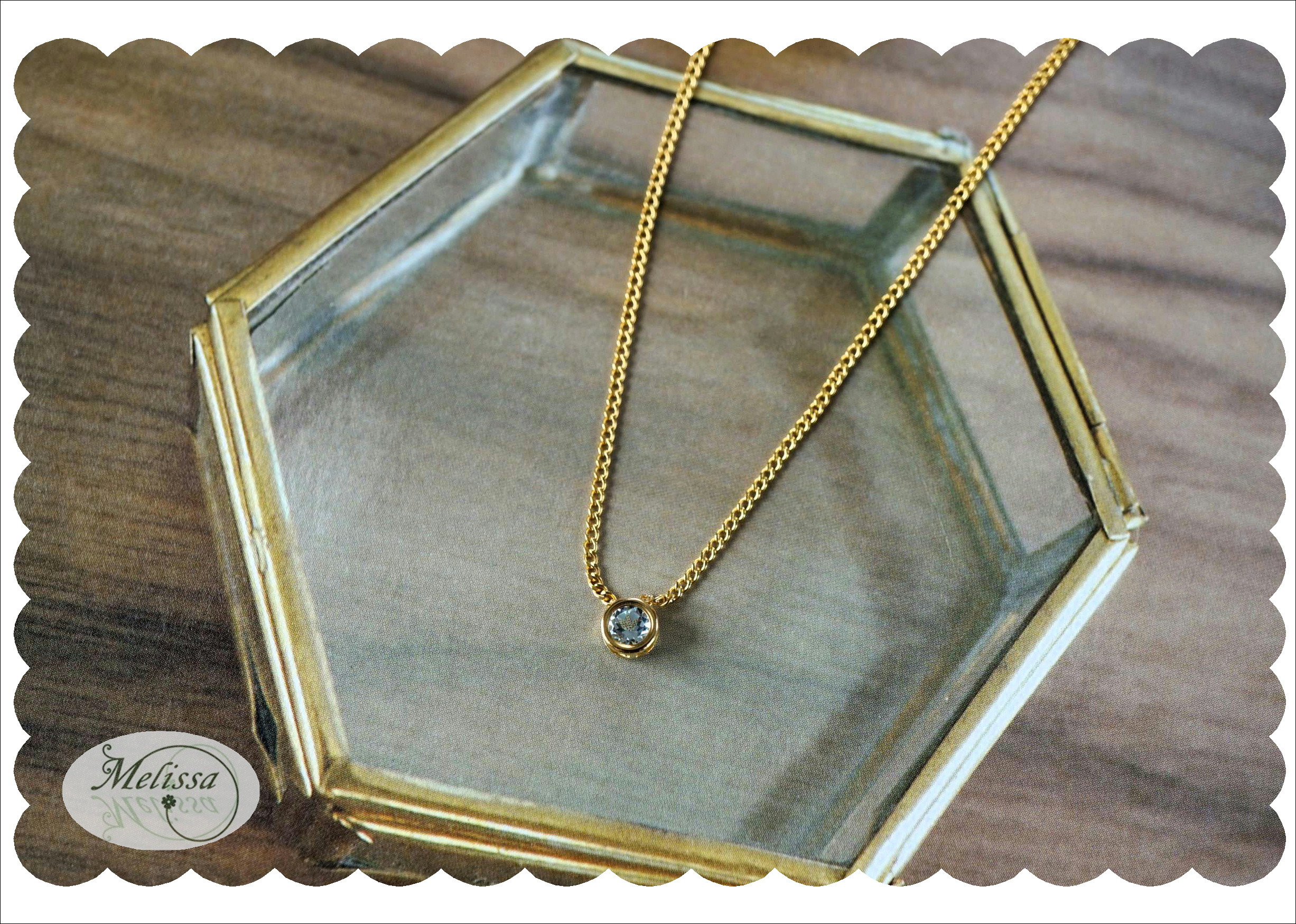 ブルートパーズのベゼルネックレス