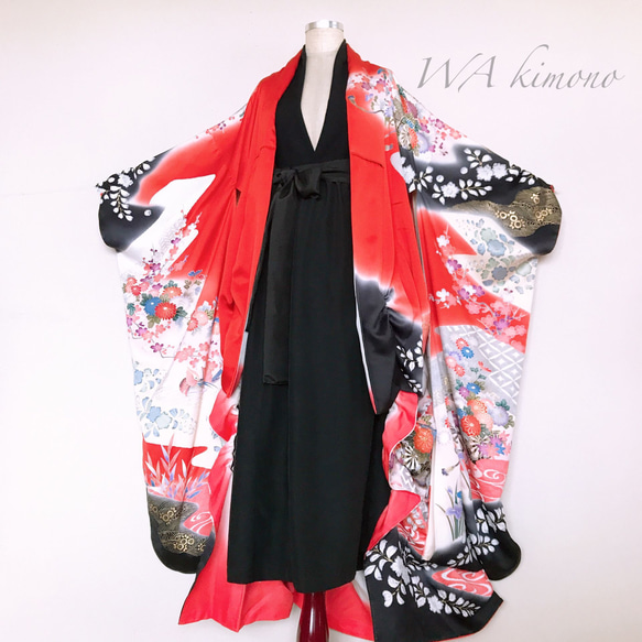 サッシュベルト付き 赤黒で魅せるフレアーロングワンピース 結婚式