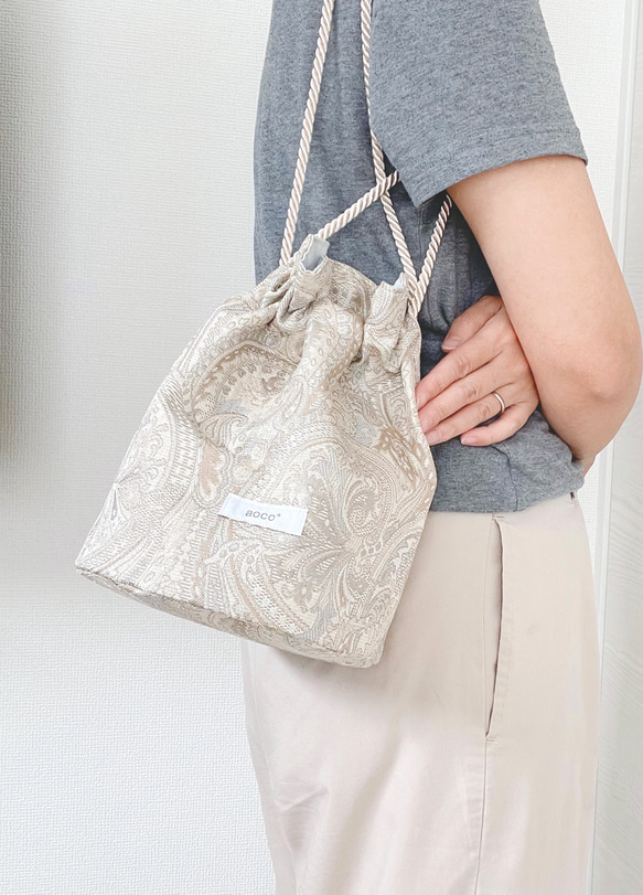 A VACATION 巾着バッグ　ペイズリー A VACATION | TANK YELLOW PAISLEY - アマンオンラインストア – AMAN