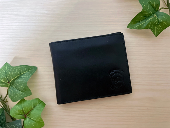 【新生活応援SALE】本革レザー 二つ折り財布 一点もの ブラック 収納力抜群 送料ラッピング無料 1枚目の画像