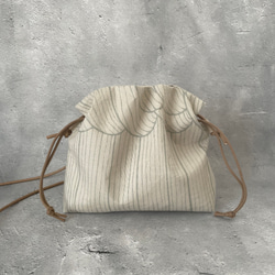⚮̈ミナペルホネン sulka beige エアリーポシェット 手拭 ポシェット