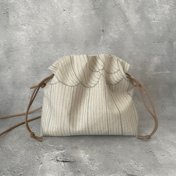 ⚮̈ミナペルホネン sulka beige エアリーポシェット 手拭 ポシェット