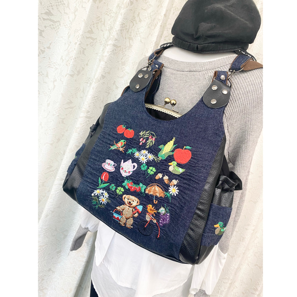 刺繍のデニム がま口バッグ あおりポケット リュック ショルダー 