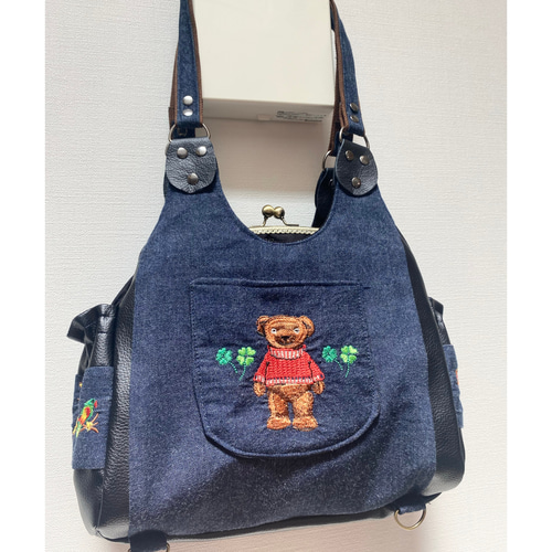 刺繍のデニム がま口バッグ あおりポケット リュック ショルダー 