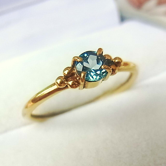 ロンドンブルートパーズのリング ラウンドファセット・カット 指輪  