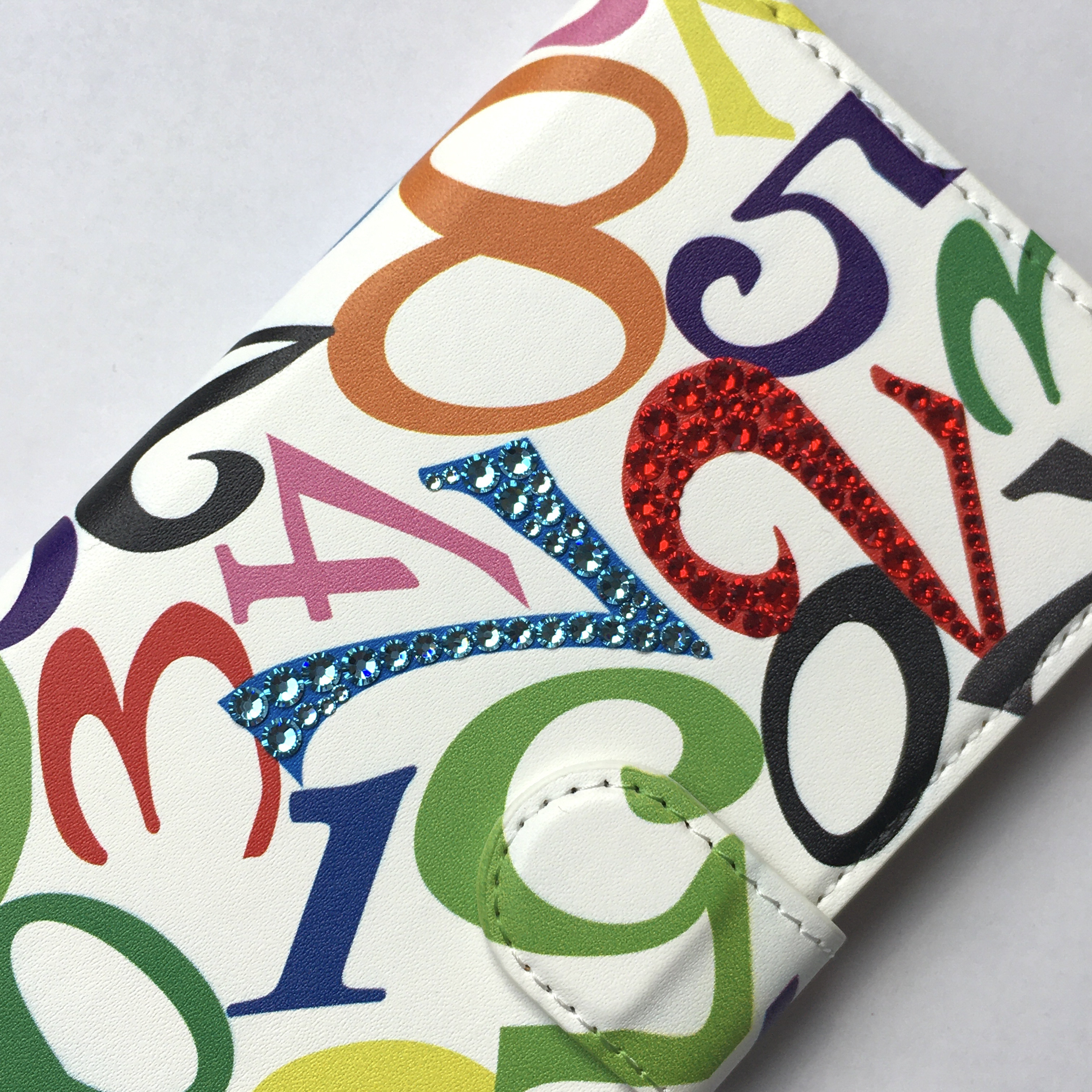 【スワロフスキー®使用】iPhone13pro手帳型ケース　アクアマリン　iPhone13proケース　数字