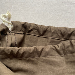 オムツポーチ・巾着袋・スタイ・木製歯固め　４点セット　カーキ×チェック柄ベージュ　出産祝い可 9枚目の画像
