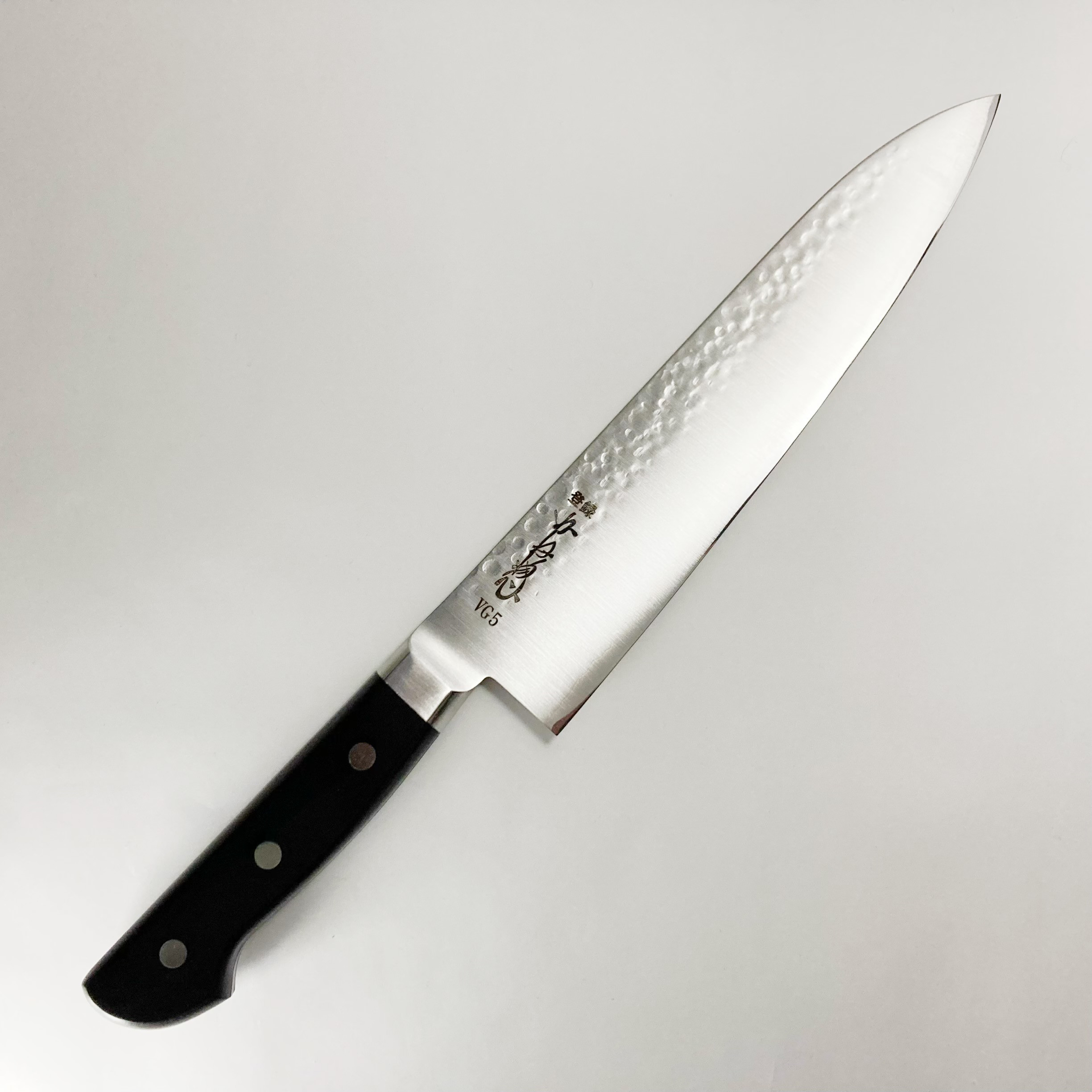 【本家かね惣】牛刀 ステンレス鋼 VG5 7寸（210mm） 鎚目仕様