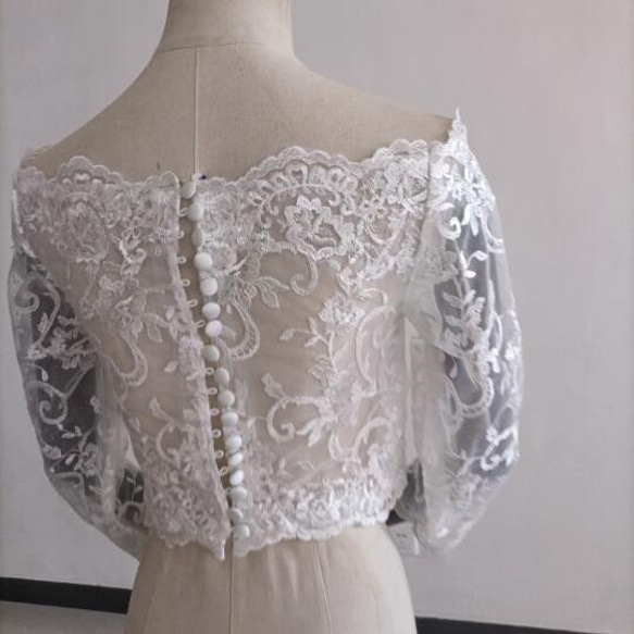 Bolero Elegant Bride 包扣長袖 第5張的照片