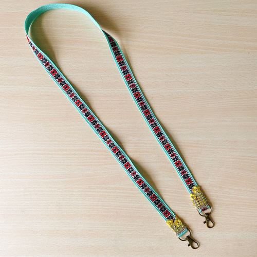 ミントグリーンのレトロ スマホショルダー ストラップ ネック