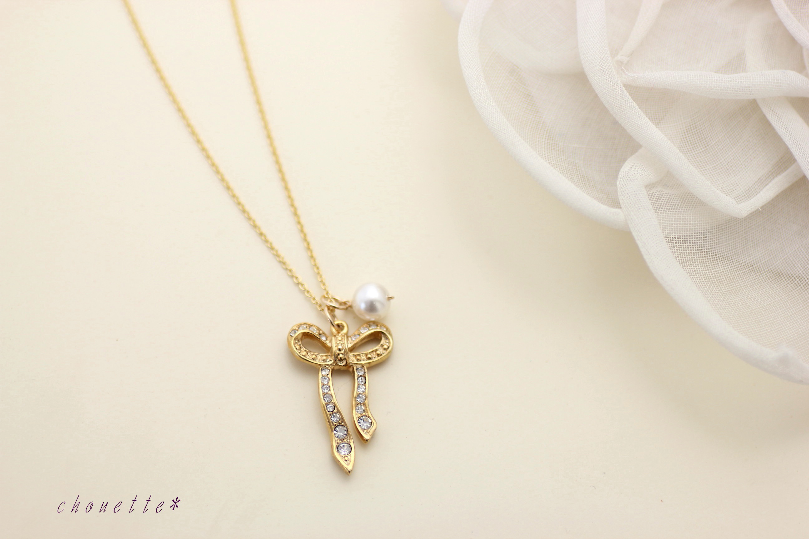 *ジルコニアリボン×スワロフスキーパールのロングネックレス*14kgf