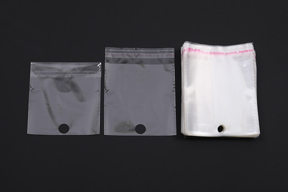Q836  200枚   OPP袋 透明テープ付き 1穴 10×14cm   2X（100枚） 2枚目の画像
