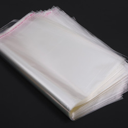 Q848  50枚  OPP袋 透明テープ付き 1穴 39.5×45cm（50枚） 3枚目の画像