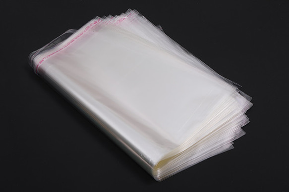 Q848  50枚  OPP袋 透明テープ付き 1穴 39.5×45cm（50枚） 3枚目の画像