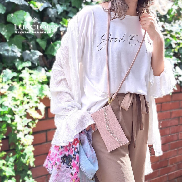 ほぼ全機種対応！スワロフスキーラインストーンデコレーション手帳型スマホケース【ライトピンク】スマホショルダーストラップ 1枚目の画像