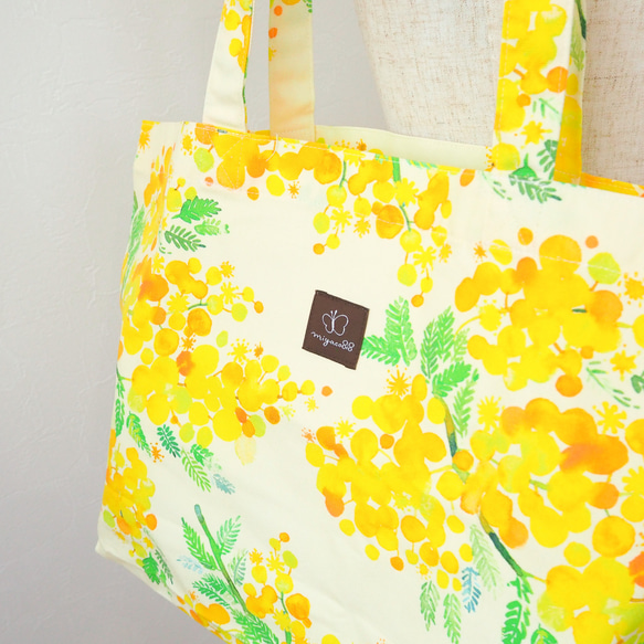 「Mimosa」還有原創織物手提袋和環保袋可供選擇。 第5張的照片