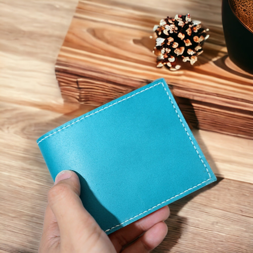 ターコイズブルーのレザーふたつ折り札入れ 革小物 財布 ふたつ折り