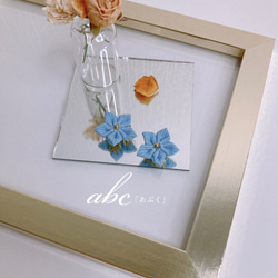 【幸せを願う】水色のお花のイヤリング・ピアス 1枚目の画像