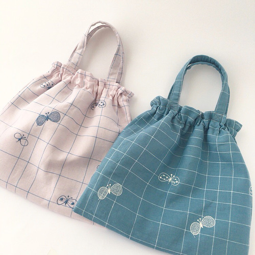 巾着ゴムバッグ(ミナペルホネンchoucho)ライトピンク 巾着バッグ
