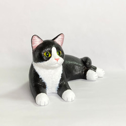 黑白八件貓雕像 第4張的照片