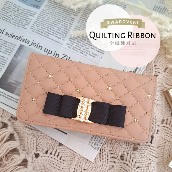 ＼ほぼ全機種対応／キルティング ビッグリボン の 高級24金スワロフスキーデコレーション 手帳型スマホケース　ベージュ 1枚目の画像