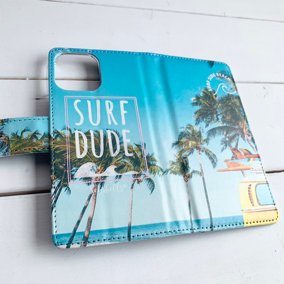 ワーゲンバスとヤシの木の写真  手帳型iphoneケース ハワイアンブックタイプケース 交通系カード入れ 海の景色 1枚目の画像