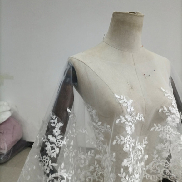 非常受歡迎的可愛優雅頂篷風格波列羅婚紗盛開透明花朵蕾絲 第6張的照片