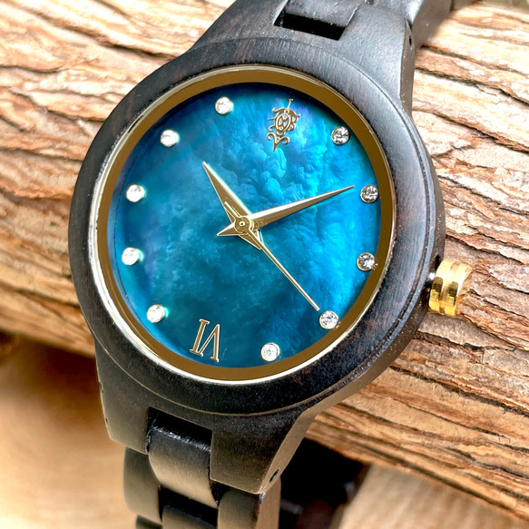 【木製腕時計】EINBAND Prima マザーオブパール×スワロフスキー エボニーウッド ブルー文字盤 34mm 1枚目の画像