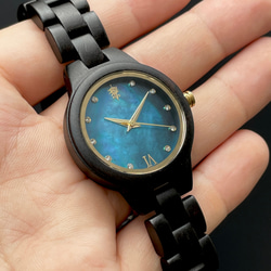 【木製腕時計】EINBAND Prima マザーオブパール×スワロフスキー エボニーウッド ブルー文字盤 34mm 4枚目の画像