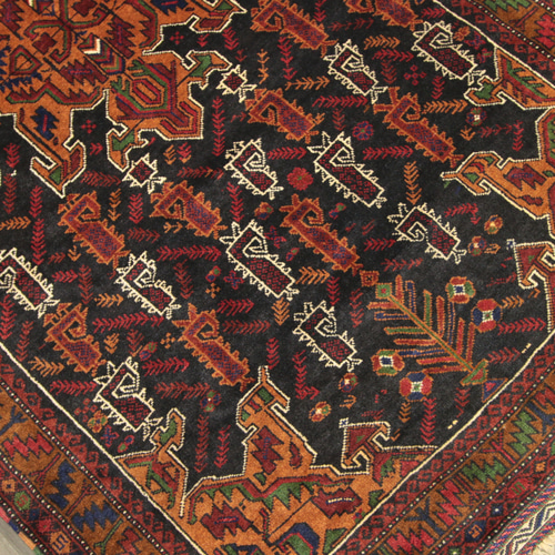 茶系のアンティークトライバルラグ ペルシアンバルーチ絨毯