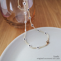 yellow * white flower 白い花のビーズネックレス　ビーズアクセサリー　フラワー　淡色　透明感　クリア 3枚目の画像