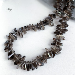 スモーキークォーツAAA-タンブルカットクレオ穴 10粒 　天然石パーツ 1枚目の画像
