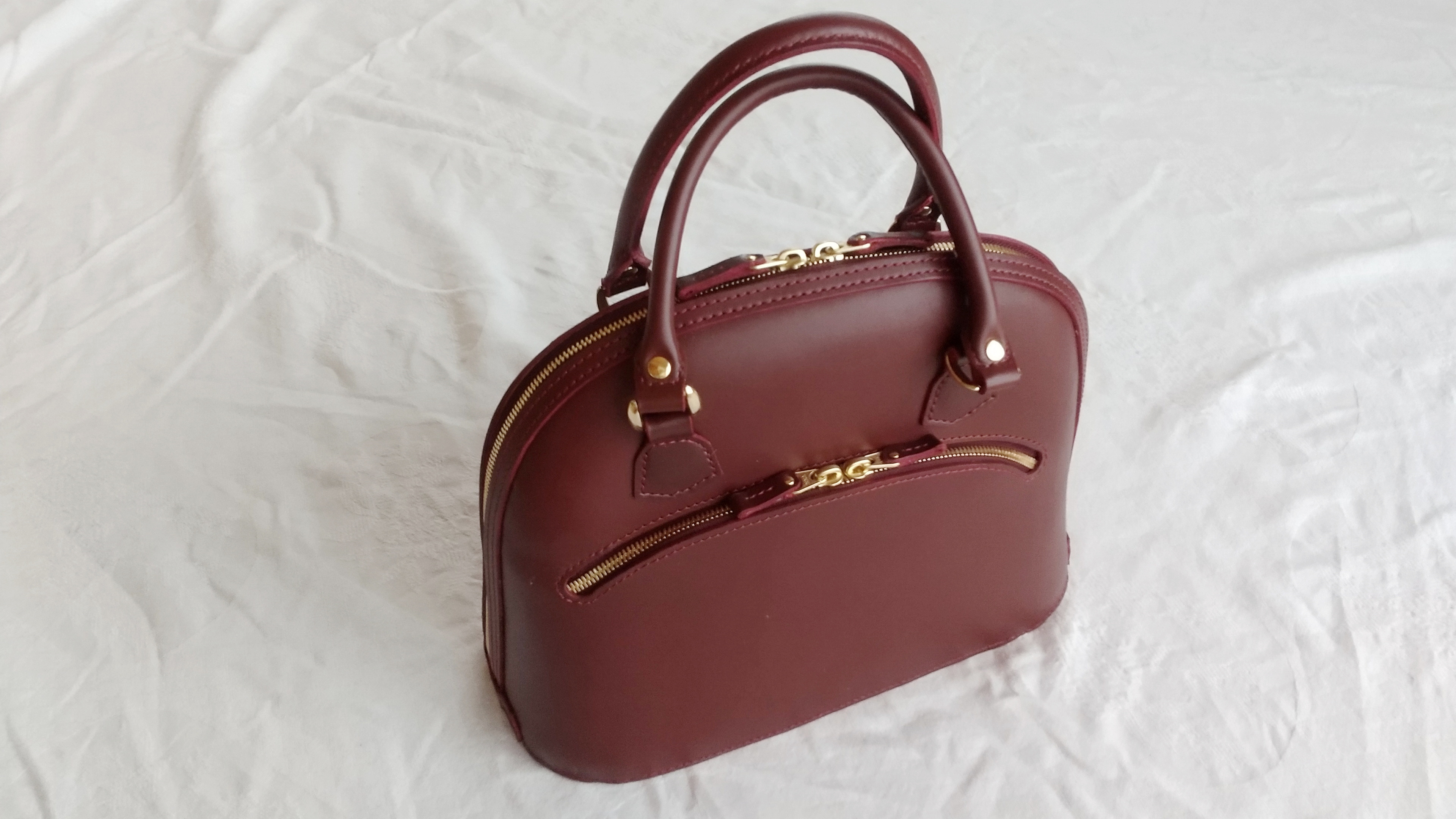 【受注制作】ヌメ革のブガッティ型バッグ（中型）