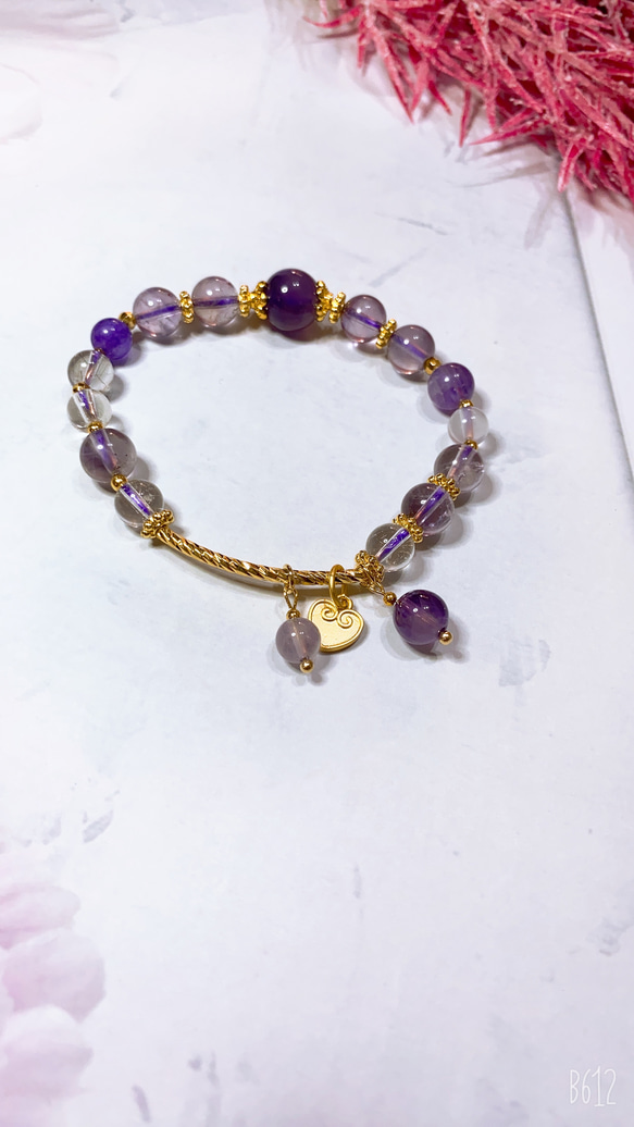Anna’s 水晶設計~紫水晶白水晶（彈力繩款）～ 第1張的照片