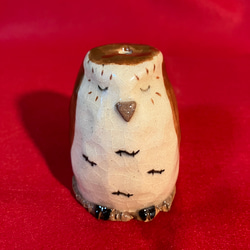 ほーほー鳴るミミズク笛人形ねんね 1枚目の画像